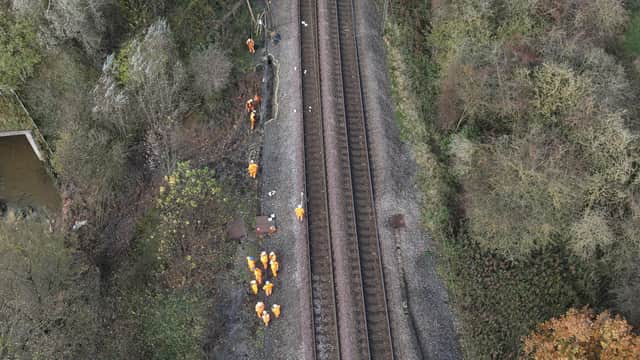 Engineers at the site of the Aycliffe landslip working to repair the railway. Photo: Network Rail
