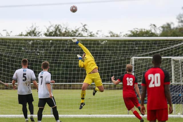 New Louth keeper Alex Lait in action against Armthorpe on Saturday.