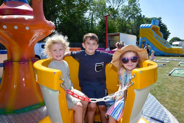Enjoying a ride: Hallie Colman, 3, Remy Coleman, 6, and Connie Anderman, 3, of Skegness.