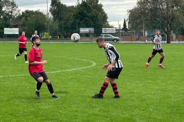 Action from Saturday's emphatic win for Barnetby (in stripes).