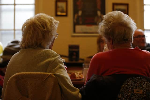 Older people at a charity tea party in London.