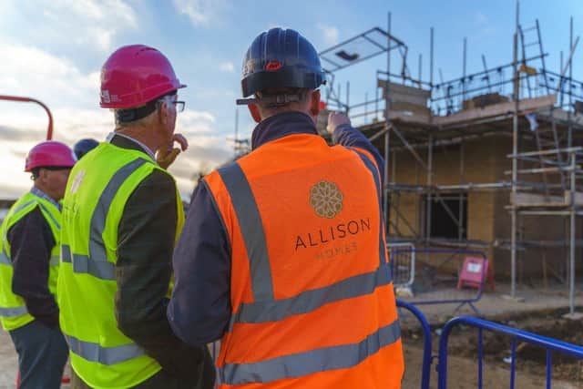 Former landowners and Allison Homes staff touring the site