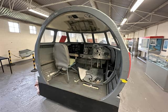 Inside the cockpit of one of the flight simulators.