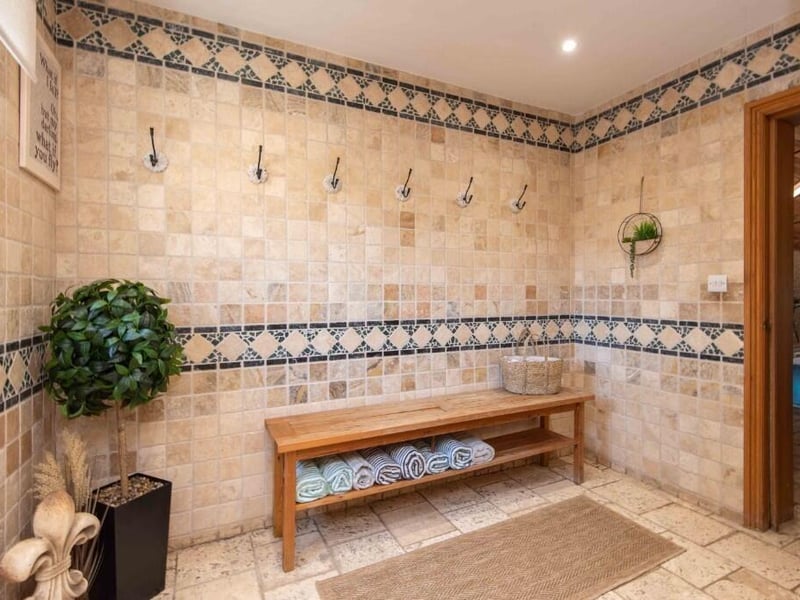 A changing area off the pool room.