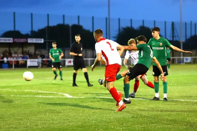 Sleaford's Joe Smith scores during the win at Skegness. Photo: Steve W Davies Photography.