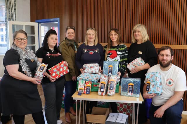 Lincolnshire Co-op colleagues present wrapping at Horncastle