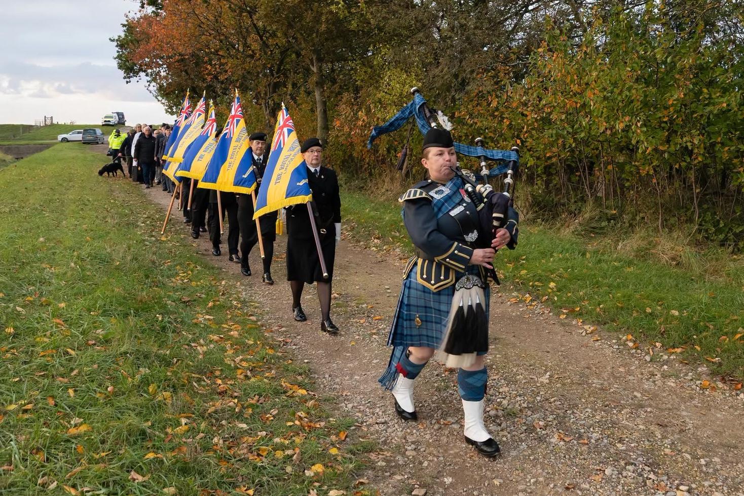 A procession makes its way towards the site of the memorial near Benington.