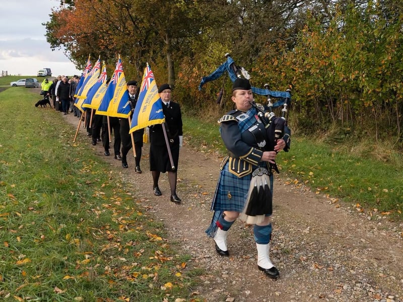 A procession makes its way towards the site of the memorial near Benington.