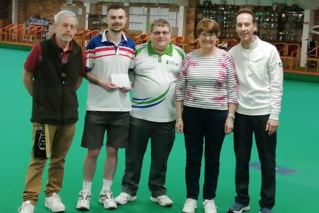 Winners of the bowls-cricket tournament, Ron Moore, Nathan Dunnington, organiser Scott Whyers, Heather Scarboro and Howard Williams