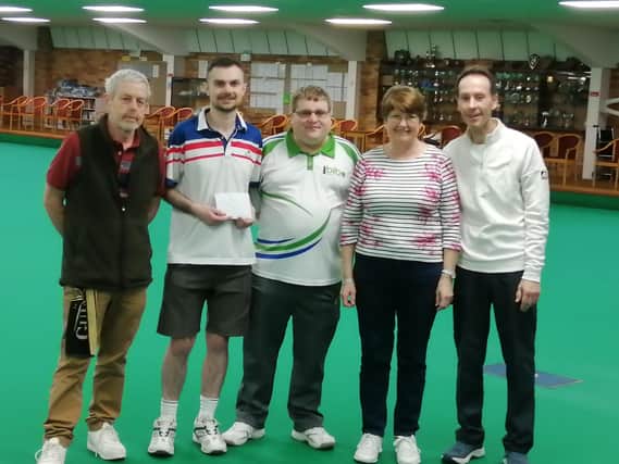 Winners of the bowls-cricket tournament, Ron Moore, Nathan Dunnington, organiser Scott Whyers, Heather Scarboro and Howard Williams
