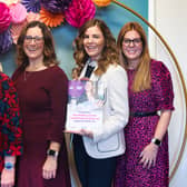 Coun Natalie Oliver (second from right) and breastfeeding services leaders and the new strategy. Photo: LCC