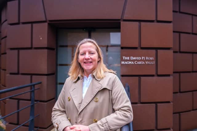 Coun Lindsey Cawrey at the entrance to the Magna Carta Vault at Lincoln Castle. Photo: LCC