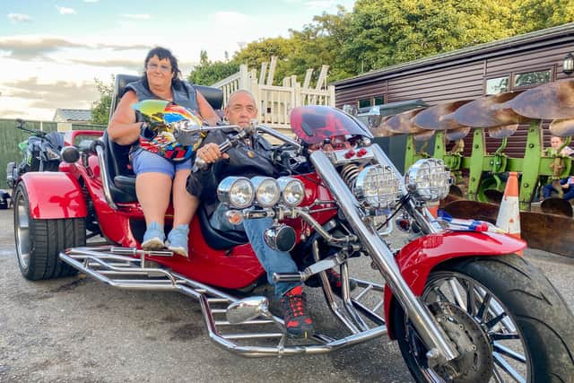 Ian and Tracey West on their Trike, the "Red Phantom".