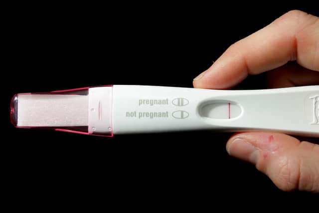 A home pregnancy test, and its instructions.
