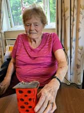 Resident at HC-One’s Clarendon Hall Care Home taking part in bird house making arts and crafts session