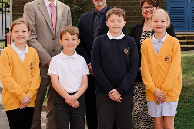 Student councillors (left to right) Nora, George, Henry and Molly with (back, left to right) Mr Brown, Dr Dunn and Mrs Cook after the positive Department for Education decision was announced.