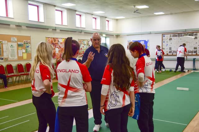 Under 21 girls receive instruction from Martin Mcgregor, English Short Mat Bowls Association coaching director. Photo: HOLLY PARKINSON