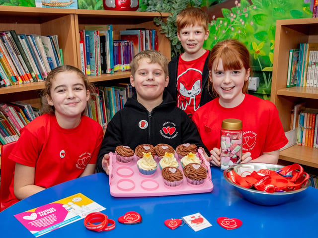 Pupils with some of the heart-themed items in aid of Heart Link. Pictured, from left, are Edith-Rose Ballam, 10, William Hough, six, Alfie Dean, seven, and Ellie Dean, nine.