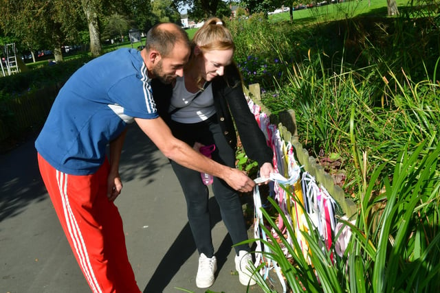 Joe Scarborough and Kayleigh Etock of Sibsey looking at their ribbon and memory card