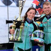 Emmanuelle Clement and Todd Ellis celebrate their win. Photo by Wally Walters.