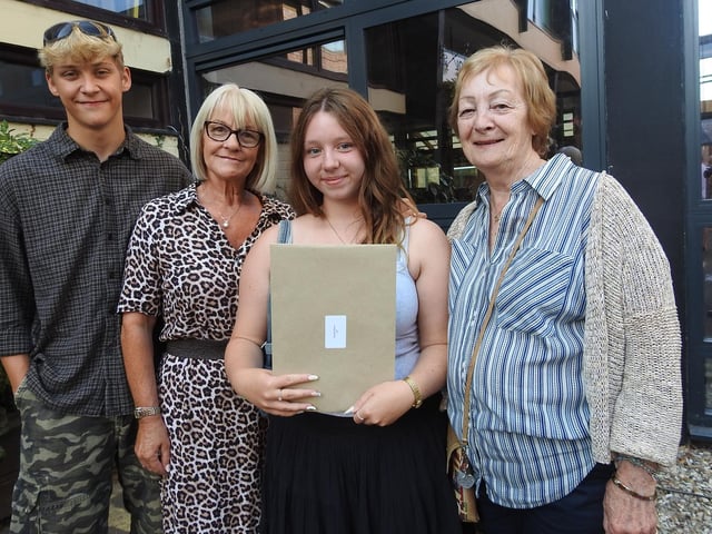 A family celebration - Darcie Silson, of Sleaford, achieved two A grades and a B to study biochemistry at the University of East Anglia. She is pictured with boyfriend Matthew Crysell who will be studying law - also at the UEA, as well as mum Kate Merrikin and nana Carol Silson.