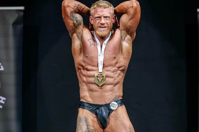 Tim wins the Classic Physique at the Battle of Bedford.