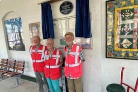 Members of the Railway Heritage Trust with the new plaque. Photo supplied