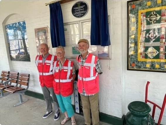 Members of the Railway Heritage Trust with the new plaque. Photo supplied