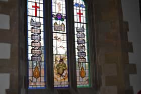 The stained glass window dedicated to the 1st Airborne Signals Regiment in Caythorpe.