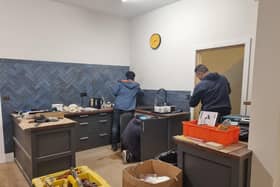 Asylum seekers doing voluntary work in the Storehouse in Skegness.