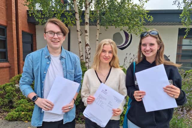 Joshua Stroud, 18, Maria Lewandowska, 18, and Lauren Brown, 18, with their results.