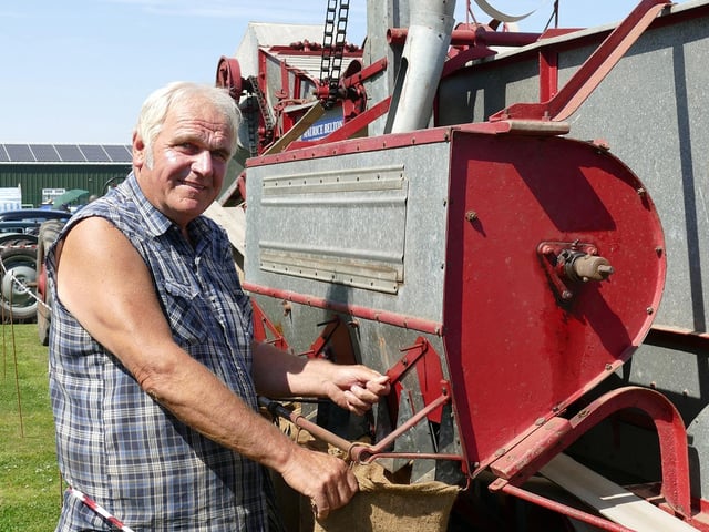 Morris Belton with his 1912 American threshing machine.