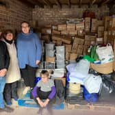 Volunteers with the donations already collected.