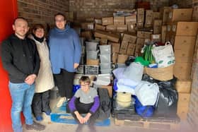 Volunteers with the donations already collected.
