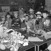 Here we see a group of youngsters taking part in an Easter bonnet craft session at Blackfriars Theatre, in Boston, in 1993.