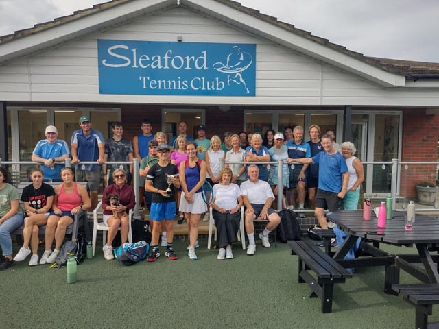 The winners with players and spectators.