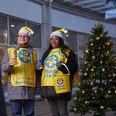 Marie Curie volunteers collecting Christmas donations.