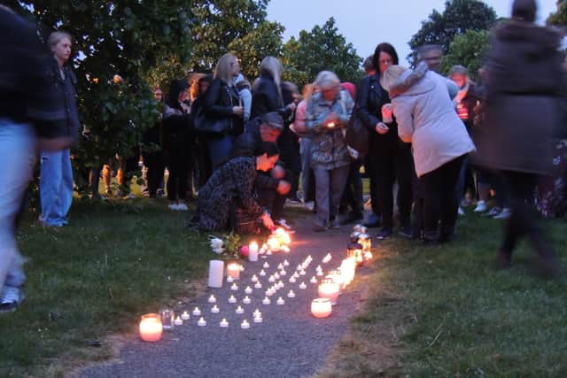 Diana's name was spelled out in lights and people at the vigil added more lights and candles at the end of the event.