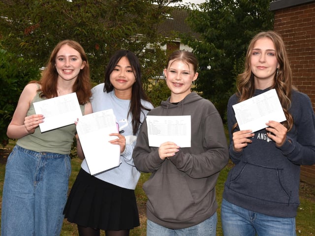 Smiling faces after receiving results.