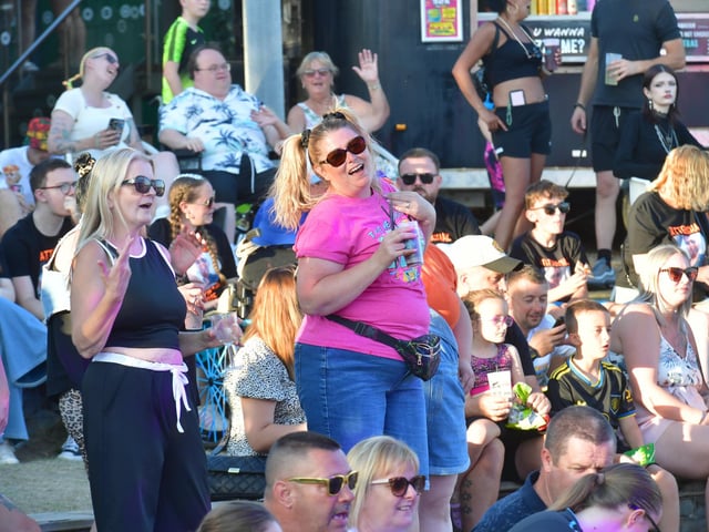 Dancing to the tunes.
