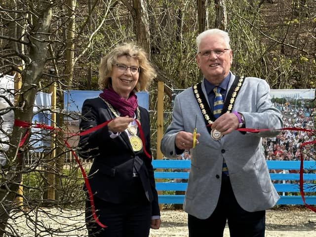 City Mayor of Bad Gandersheim Franziska Schwar and Mayor of Skegness Coun Tony Tye cutting the ribbon of the beach garden.