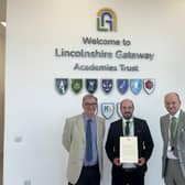 Principal Joe Hermiston with the letter from Sir Kier Starmer and chair of the board of Lincolnshire Gateway Academies Trust Philip Bond (left) and its Chief Executive Officer Martin Brown.
