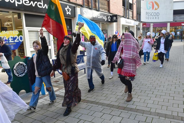 The procession as it makes it way through Pescod Square.