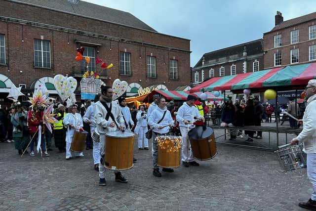 Fire Funk, led by Chris Lewis-Jones, made its way through the Market Place