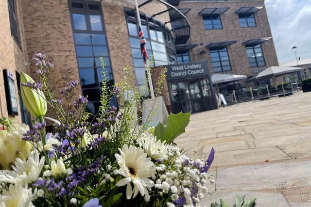The floral tribute has been laid at the council’s flag poles