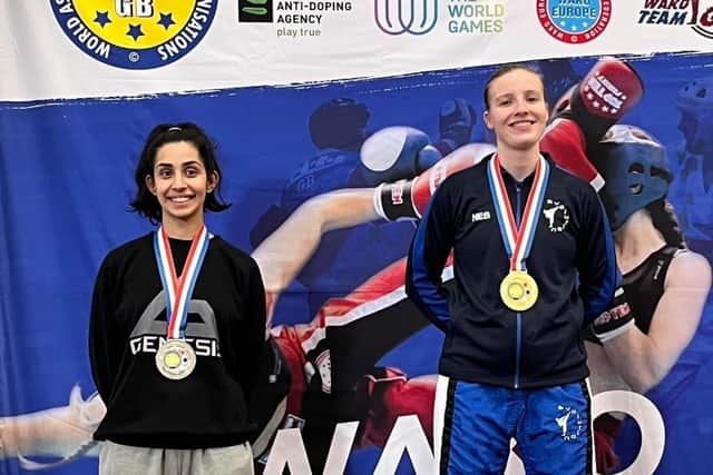 Evolution's fighters celebrate their success on the podium.