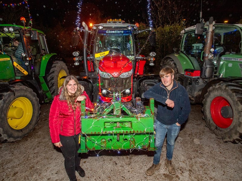 Kaci West and Sam Edwards from Wrangle with a Massey Ferguson S7719.