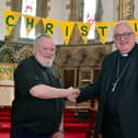 The new Bishop of Lincoln the  Rt Rev Stephen Conway is welcomed to St Matthew's Church, Skegness, by the Rev Richard Holden.