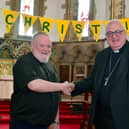 The new Bishop of Lincoln the  Rt Rev Stephen Conway is welcomed to St Matthew's Church, Skegness, by the Rev Richard Holden.