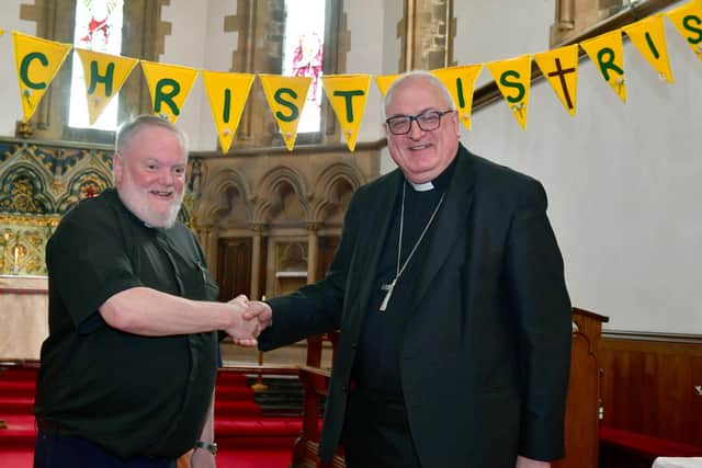 The new Bishop of Lincoln the  Rt Rev Stephen Conway is welcomed to St Matthew's Church, Skegness, by the Rev Richard Holden.